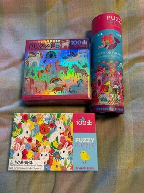 Three Crocodile Creek Kids 100-Piece fuzzy and Holographic Puzzle s
